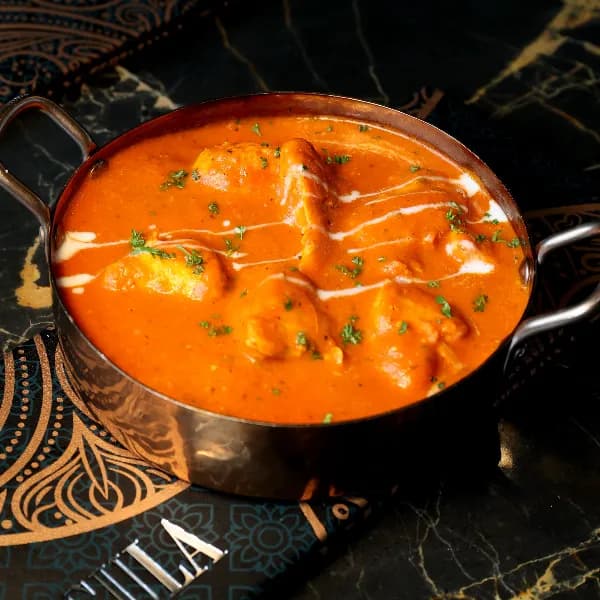 Butter chicken in tomato cream sauce at Sula Commercial Drive