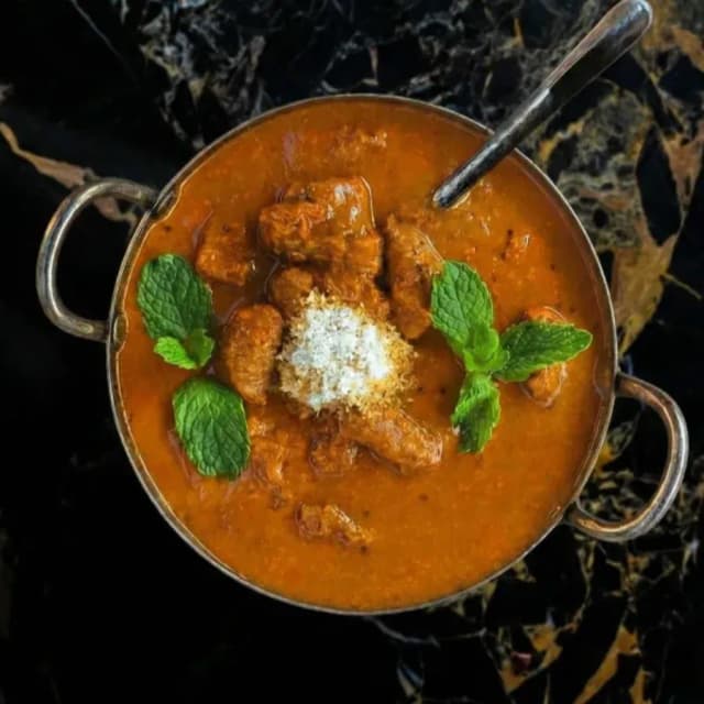 Spicy lamb vindaloo at Sula Downtown Vancouver