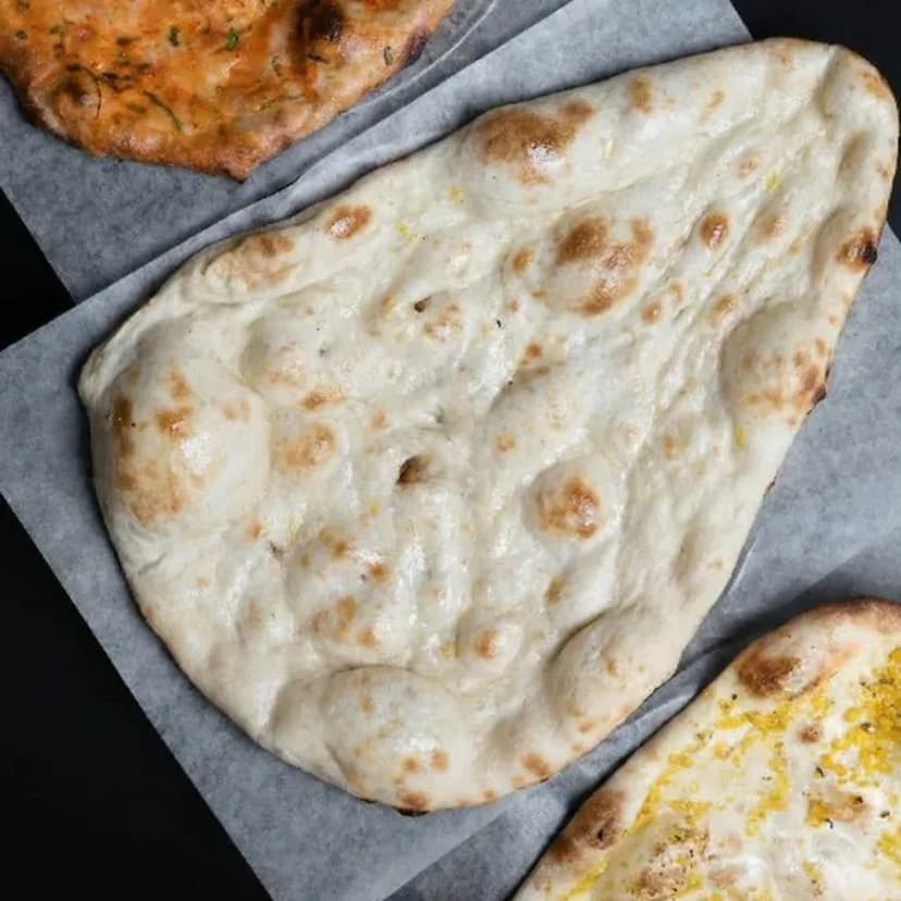 Freshly baked naan at Sula Commercial Drive