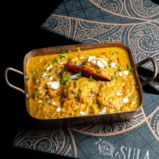 Indian chicken dish at Sula Main Street