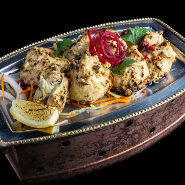 Tandoori chicken tikka marinated in Kashmiri chili at Sula Commercial Drive