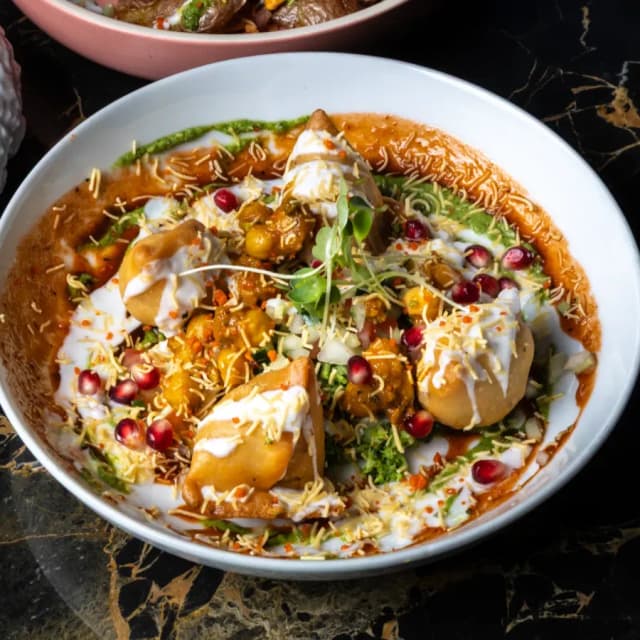 Samosa chaat with yogurt and tamarind at Sula Main Street