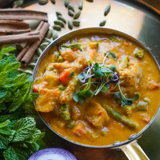 Coconut-based Indian dish at Sula Commercial Drive