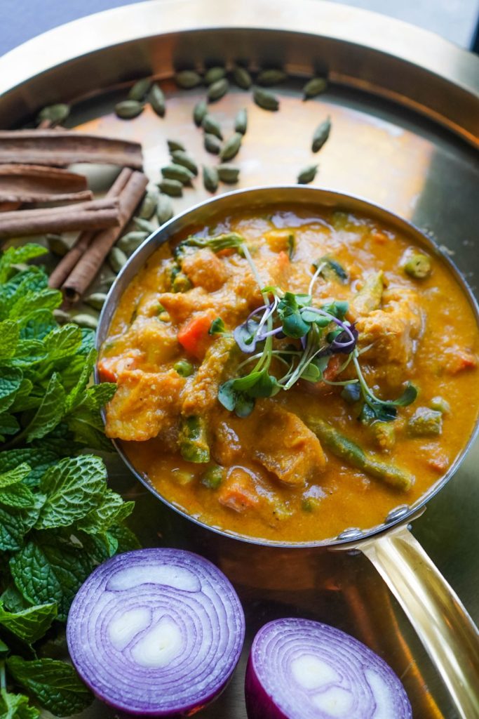 Vegetable Coconut at sula Creamy vegetable coconut curry with fresh vegetables