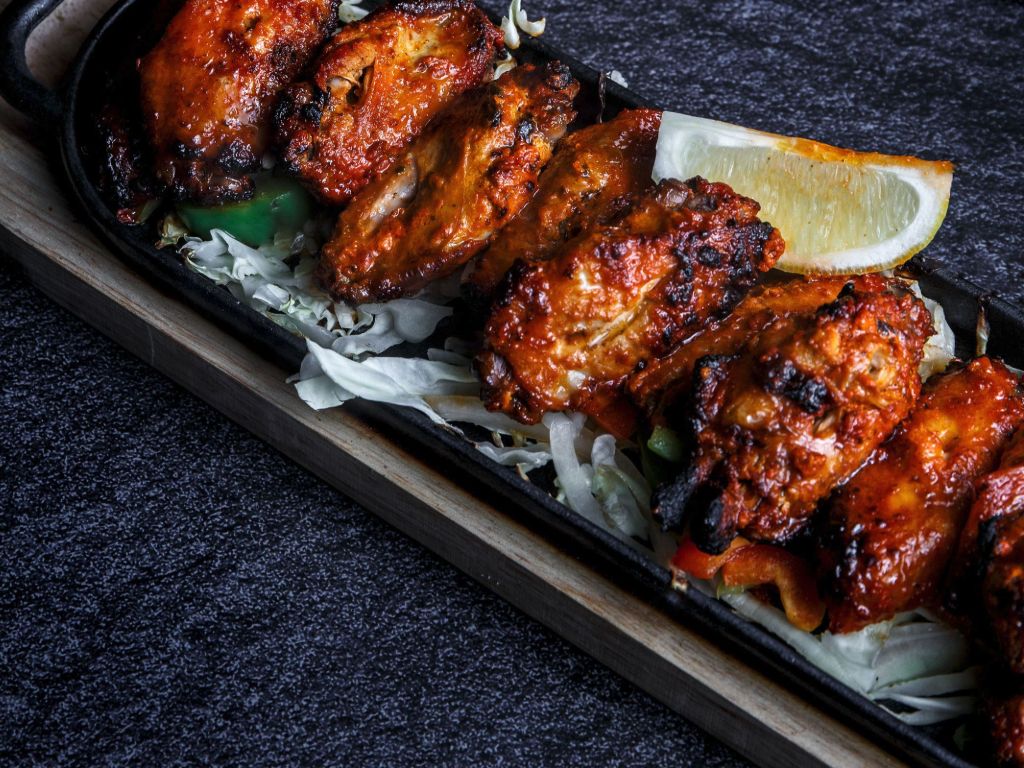 Smoky Tandoori chicken wings, perfectly grilled.
