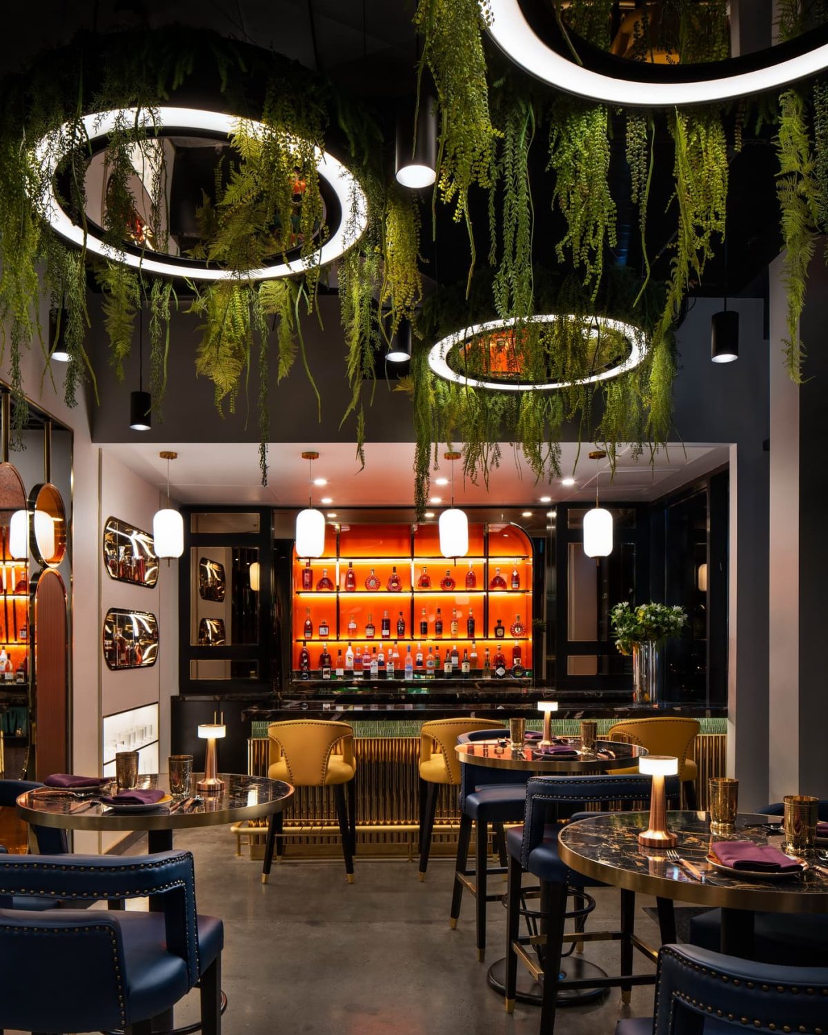 Stylish seating area with unique decor inside Sula Davie Street restaurant.