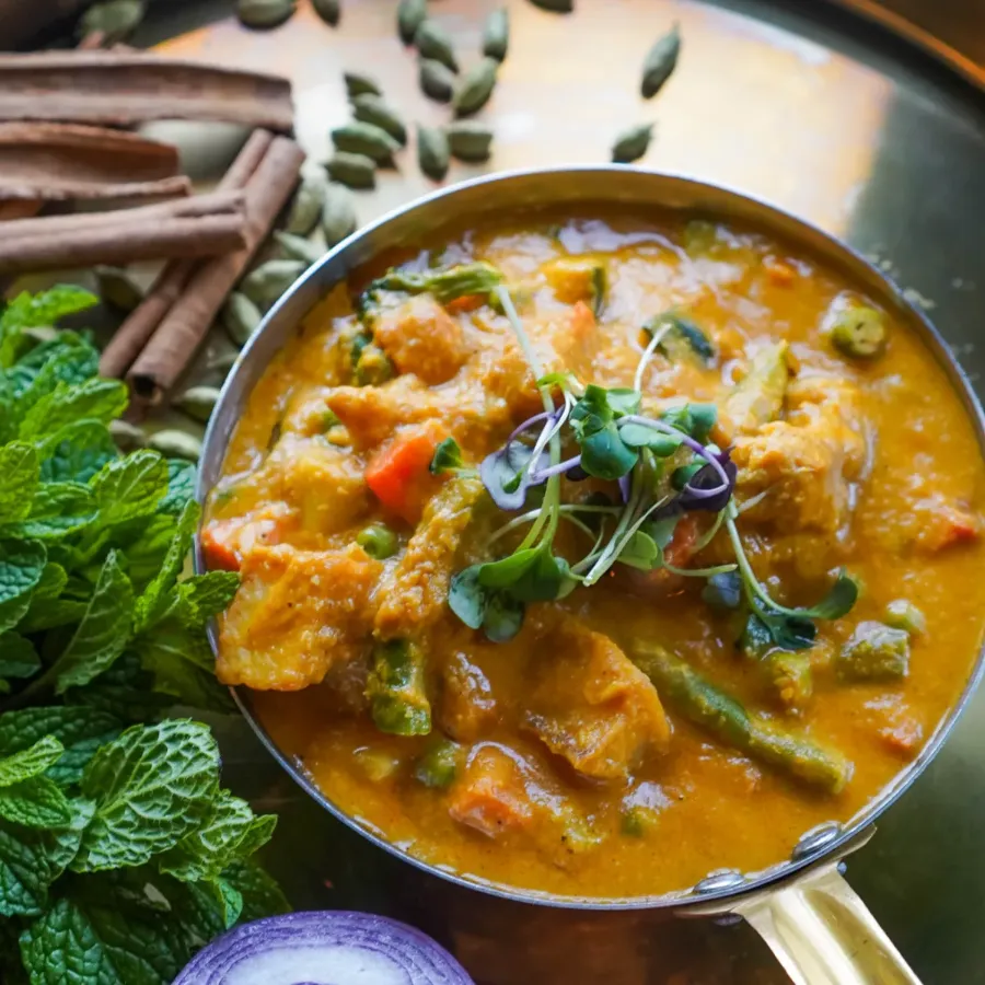 Coconut-based Indian dish at Sula Commercial Drive