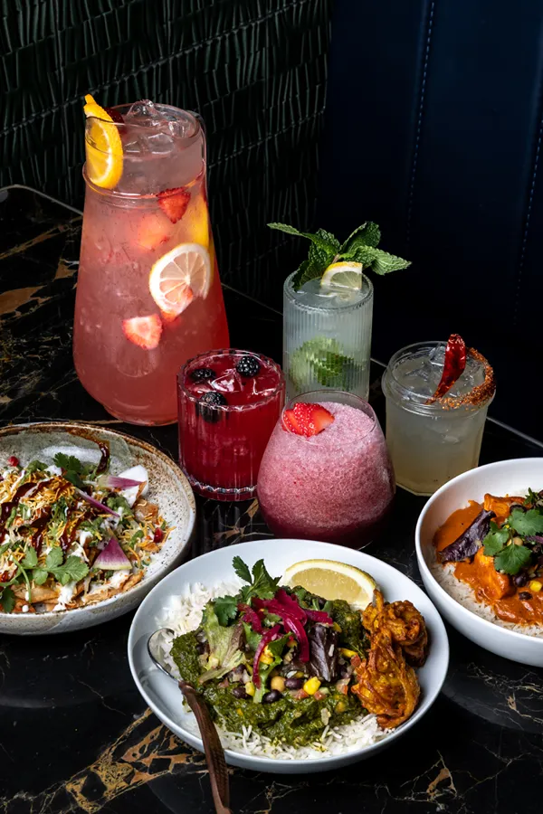 Happy hour spread of Indian food and cocktails at Sula, Vancouver