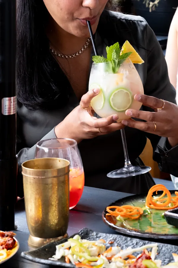 Signature cocktail at Sula Indian happy hour in Vancouver