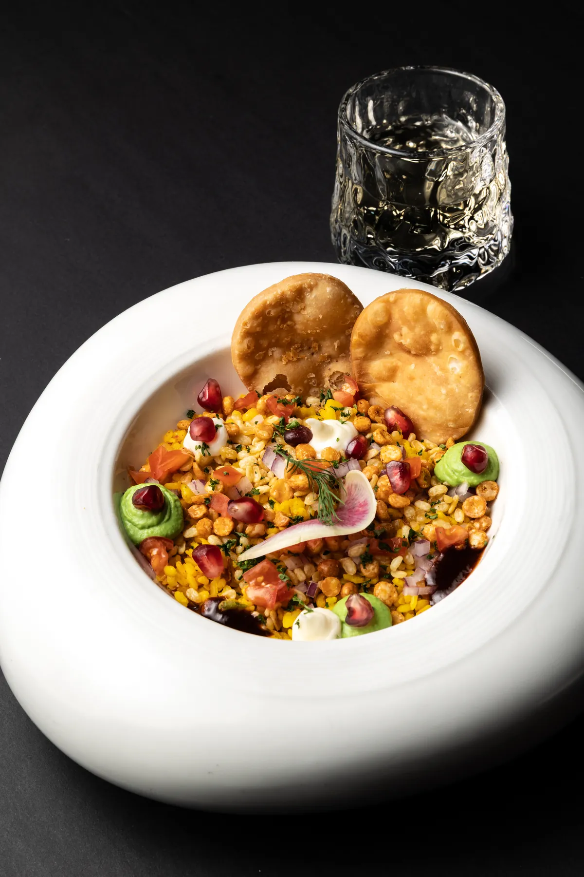 Muradabadi Dal Chaat, the Uttar Pradesh course of the Spice Route tasting menu, slow-cooked moong dal with chutneys, pomegranate and crisp puris, served with its wine pairing.